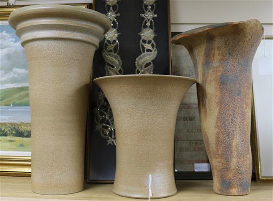 Two similar stoneware rhubarb forcers by Usch Spettigue and a tall planter by Irene Bell